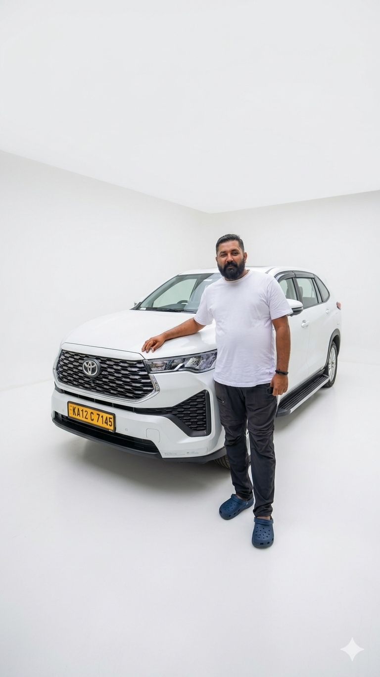 PV Vaishak standing with his Toyota Innova